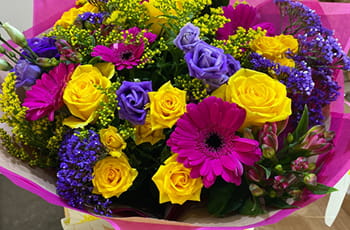 Colourful hand-tied bouquet created by a local florist