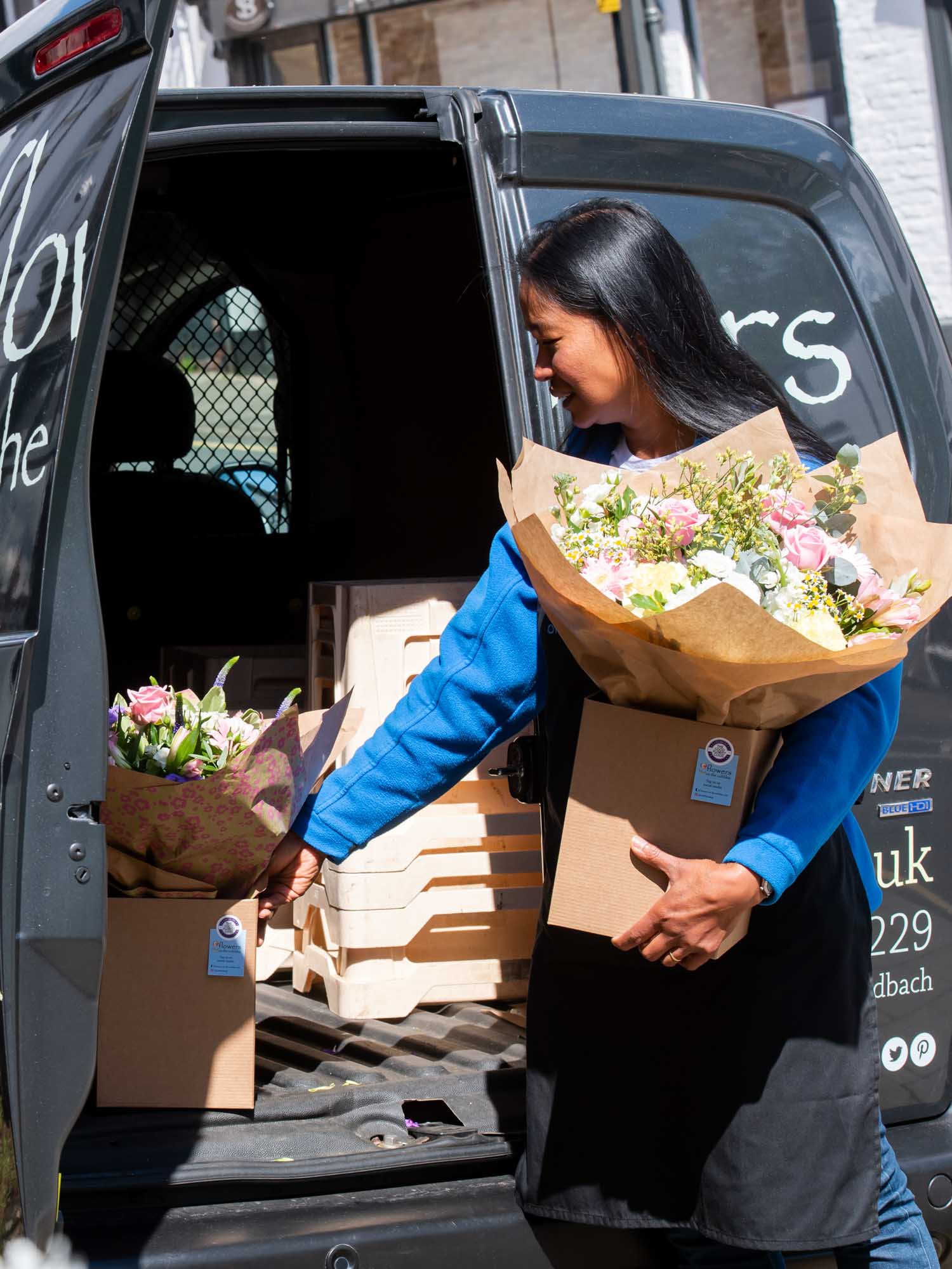Florist in Ireland preparing to deliver flowers from shop
