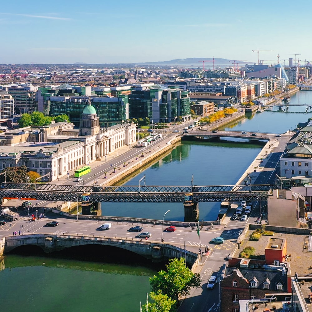 Dublin cityscape with the River Liffey, bridges, and historic architecture.