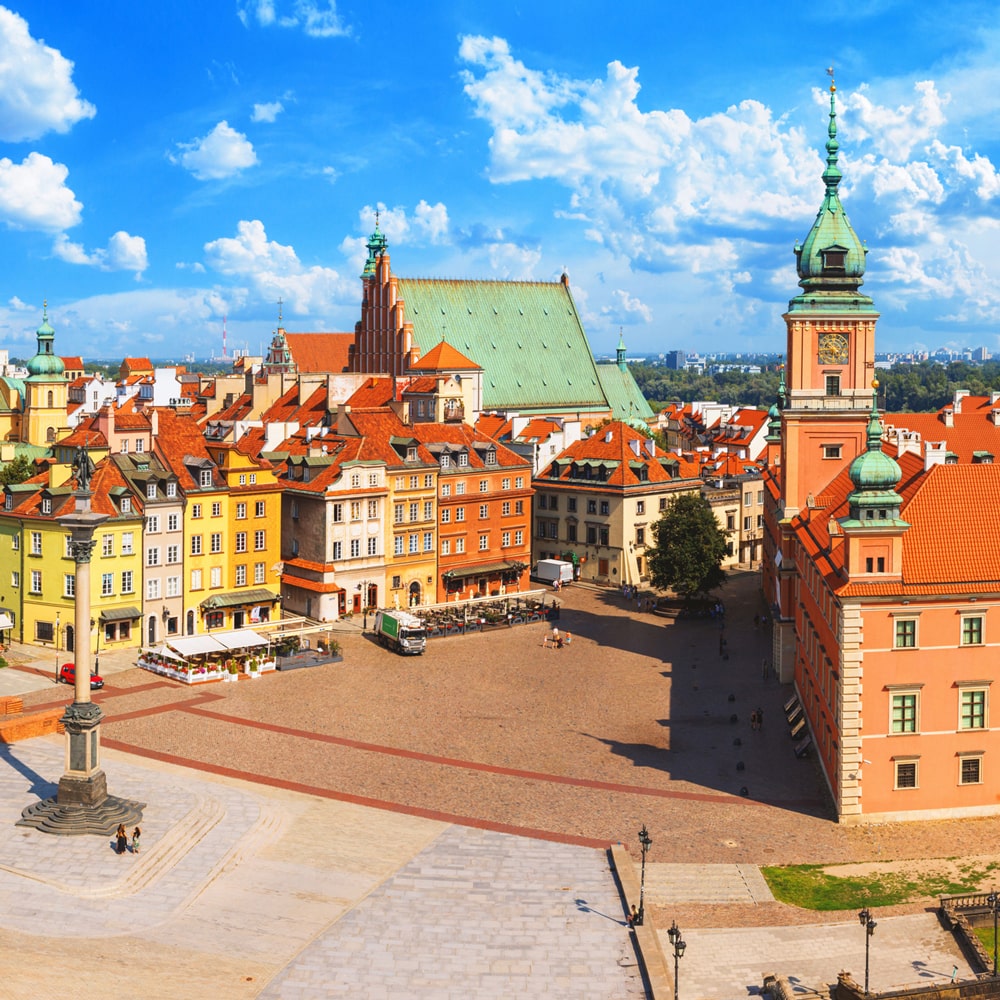 Warsaw's Old Town Market Square with colorful buildings, cobblestone streets, and historic landmarks.