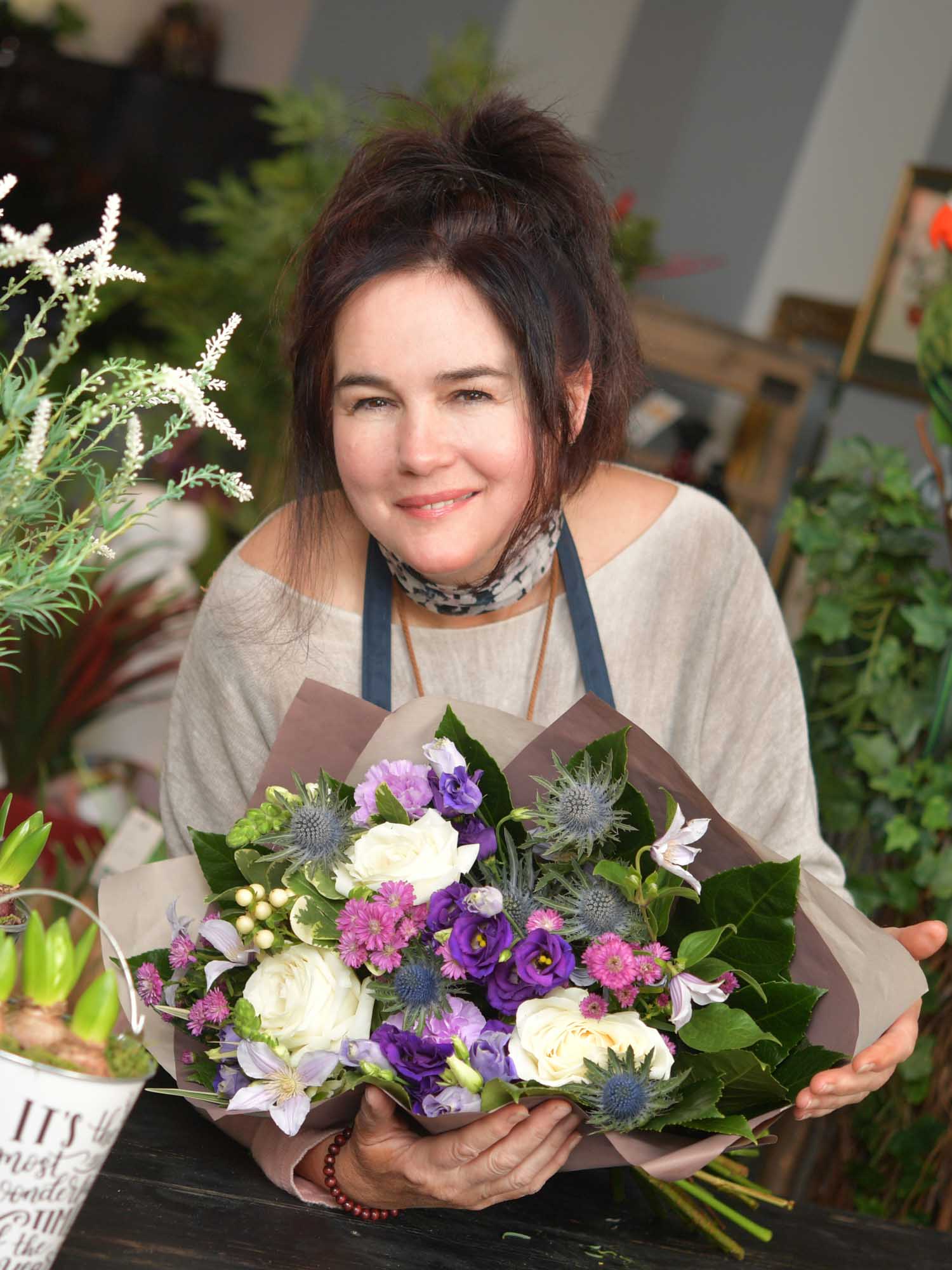 florist makes flowers for a bereavement
