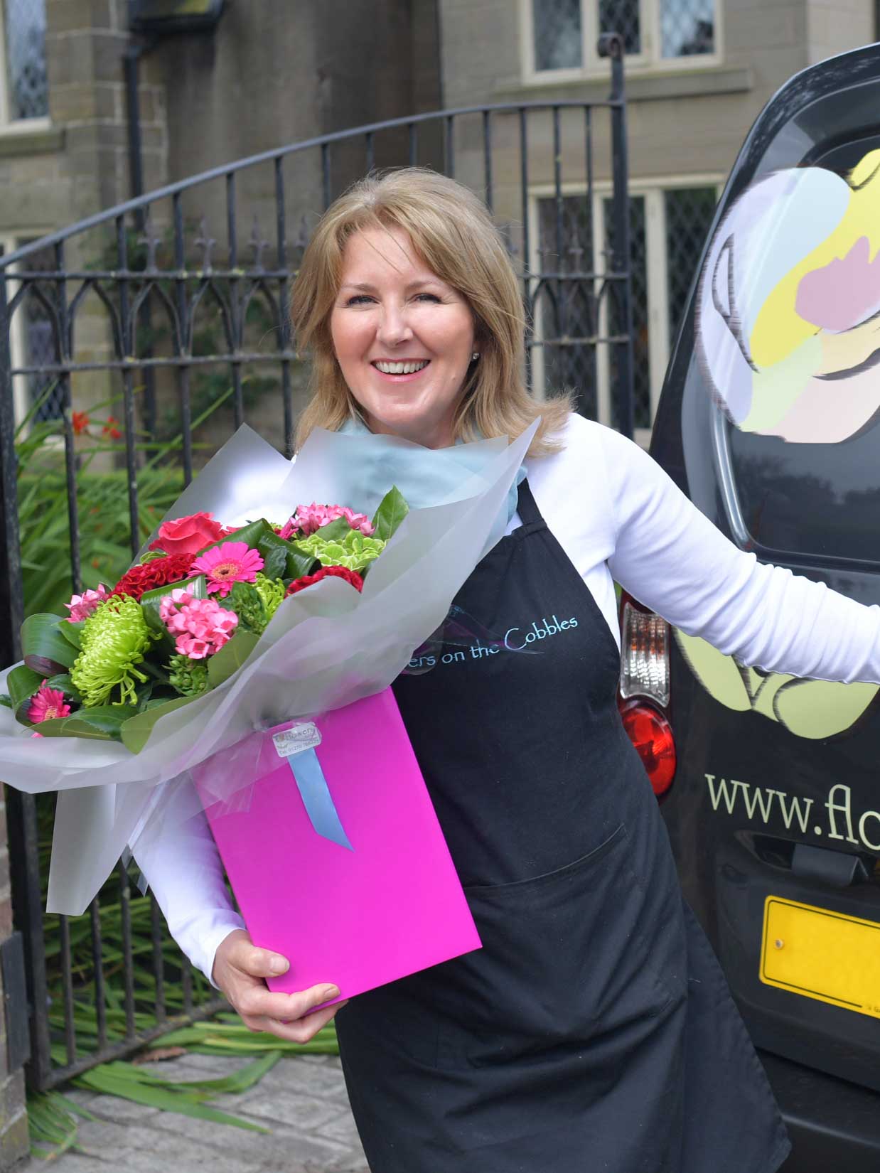 Florist delivering delicate flower basket for next day delivery in Ireland
