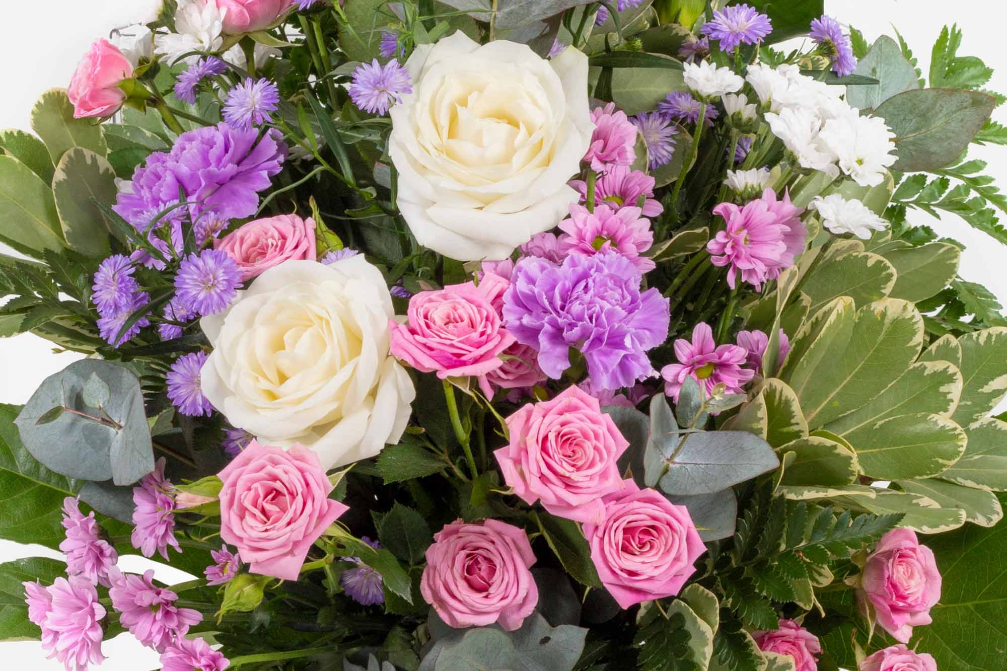 close-up of a pink, lilac and white tied sheaf on a white background